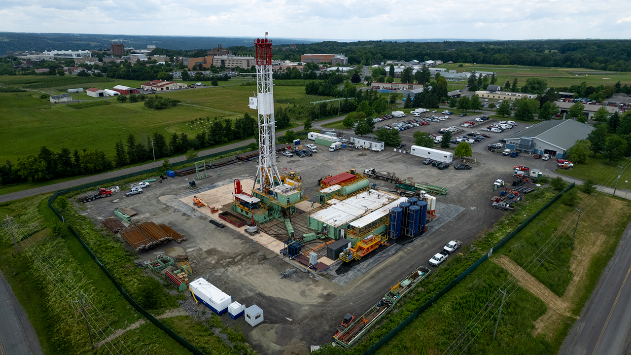 The 144’ tall derrick is shown fully raised on the CUBO drill rig on June 17, 2022.